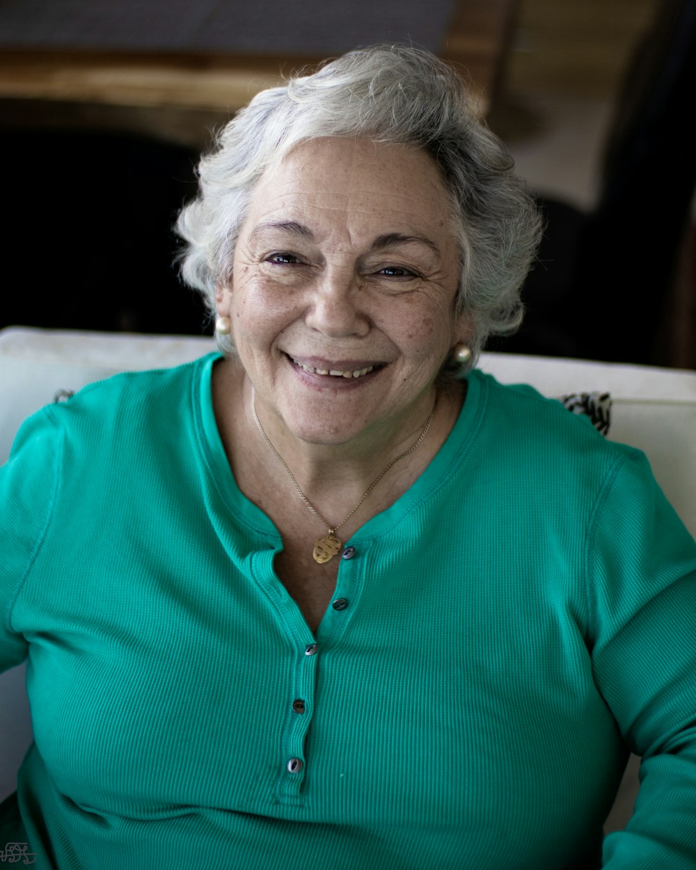 Linda, a Dundee Dental implant patient, smiling warmly
